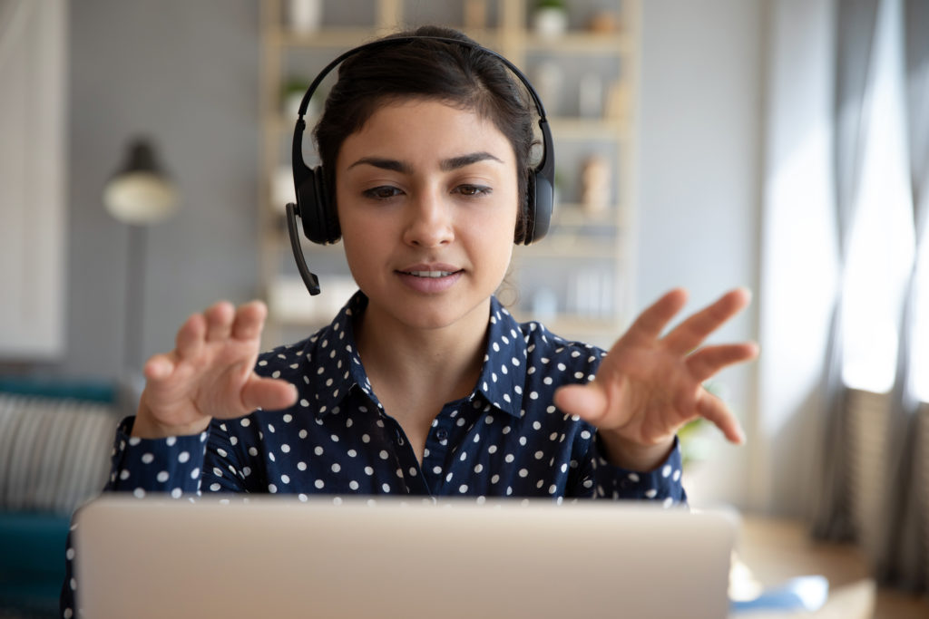 Woman With A Headset On Call | Workplace Trauma Support